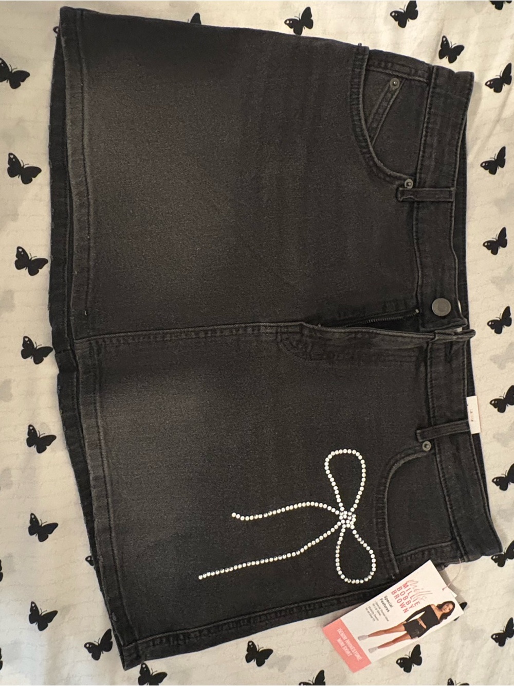 Black Mini Denim Skirt with Rhinestone Bow Accent